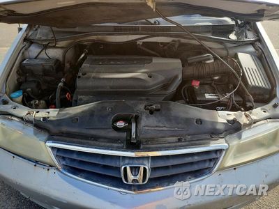 Zdjęcie 12 z 13 samochodu: 2002 HONDA ODYSSEY EXL VIN:2HKRL18942H582259 - miniatura