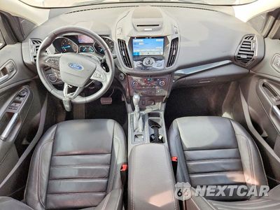 Zdjęcie 8 z 12 samochodu: 2017 FORD ESCAPE TITANIUM VIN:1FMCU0J90HUD40151 - miniatura
