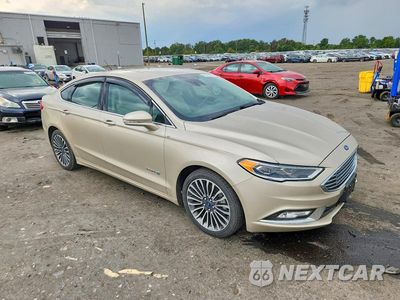 Czwarte zdjęcie samochodu z boku: 2018 FORD FUSION TITANIUM/PLATINUM HEV VIN:3FA6P0RU7JR107565 - miniatura