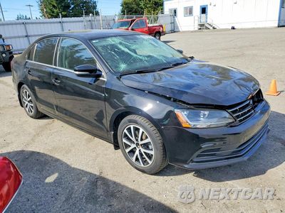 Czwarte zdjęcie samochodu z boku: 2017 VOLKSWAGEN JETTA SE VIN:3VWDB7AJ1HM258741 - miniatura