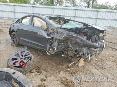 Czwarte zdjęcie samochodu z boku: 2024 TESLA MODEL 3 VIN:5YJ3E1ET7RF856501 - miniatura