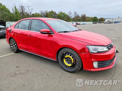 Czwarte zdjęcie samochodu z boku: 2014 VOLKSWAGEN JETTA GLI VIN:3VW4T7AJ6EM360724 - miniatura
