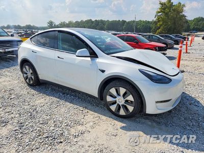 Czwarte zdjęcie samochodu z boku: 2023 TESLA MODEL Y VIN:7SAYGDEE7PF686367 - miniatura