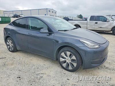 Czwarte zdjęcie samochodu z boku: 2022 TESLA MODEL Y VIN:7SAYGDEE1NA005548 - miniatura