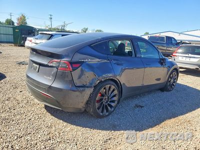 Trzecie zdjęcie samochodu z tyłu: 2023 TESLA MODEL Y VIN:7SAYGDEF4PF904399 - miniatura