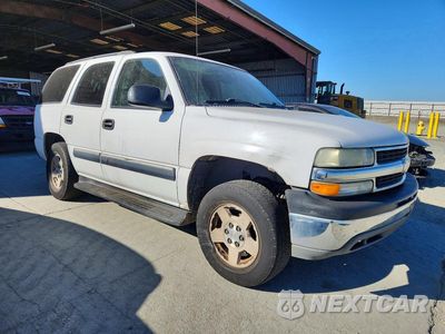 Czwarte zdjęcie samochodu z boku: 2004 CHEVROLET TAHOE C1500 VIN:1GNEC13V44J161856 - miniatura