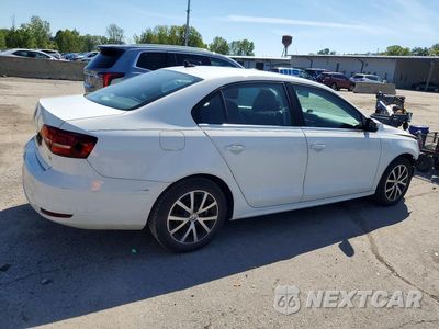 Trzecie zdjęcie samochodu z tyłu: 2017 VOLKSWAGEN JETTA SE VIN:3VWDB7AJ3HM320706 - miniatura