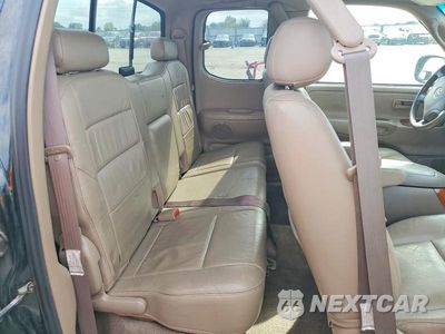 Zdjęcie 10 z 13 samochodu: 2003 TOYOTA TUNDRA LIMITED VIN:5TBBT48123S378285 - miniatura