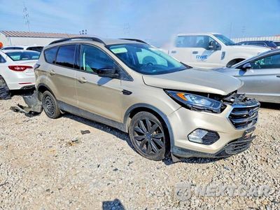 Czwarte zdjęcie samochodu z boku: 2017 FORD ESCAPE SE VIN:1FMCU9GD3HUE90223 - miniatura