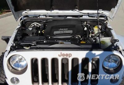 Zdjęcie 7 z 10 samochodu: 2016 JEEP WRANGLER SAHARA VIN:1C4AJWBG4GL259419 - miniatura