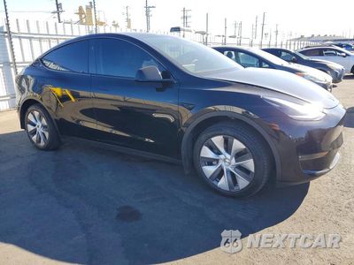 Czwarte zdjęcie samochodu z boku: 2023 TESLA MODEL Y VIN:7SAYGDEE4PA177365 - miniatura