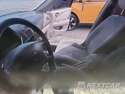 Zdjęcie 7 z 14 samochodu: 1999 TOYOTA COROLLA VE VIN:1NXBR12EXXZ266539 - miniatura