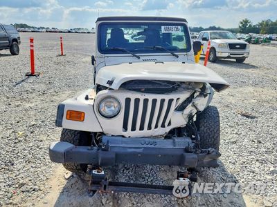 Piąte zdjęcie samochodu w środku: 2004 JEEP WRANGLER / TJ SPORT VIN:1J4FA49S14P798809 - miniatura