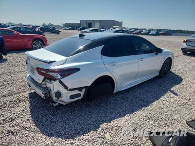 Trzecie zdjęcie samochodu z tyłu: 2024 TOYOTA CAMRY XSE VIN:4T1K61AK1RU260700 - miniatura