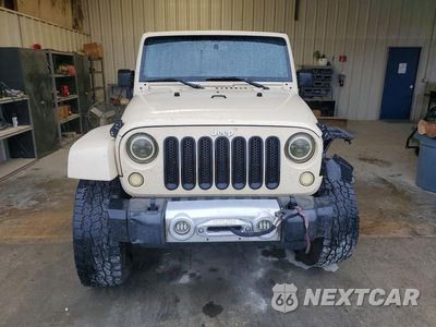 Piąte zdjęcie samochodu w środku: 2012 JEEP WRANGLER UNLIMITED SAHARA VIN:1C4BJWEG3CL106797 - miniatura