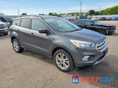 Czwarte zdjęcie samochodu z boku: 2018 FORD ESCAPE SE VIN:1FMCU9GD4JUD29496 - miniatura