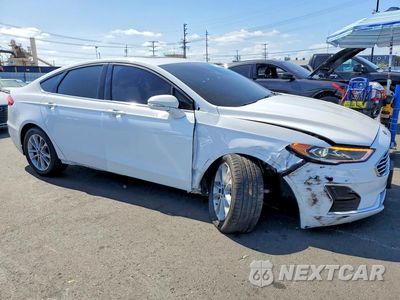 Czwarte zdjęcie samochodu z boku: 2020 FORD FUSION SEL VIN:3FA6P0MU6LR210339 - miniatura
