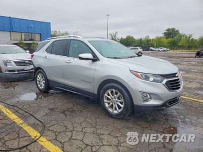 Czwarte zdjęcie samochodu z boku: 2018 CHEVROLET EQUINOX LT VIN:2GNAXJEV3J6327373 - miniatura