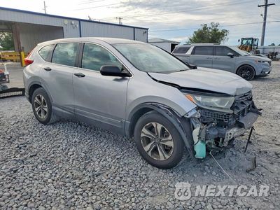 Czwarte zdjęcie samochodu z boku: 2017 HONDA CR-V LX VIN:7FARW5H37HE011919 - miniatura