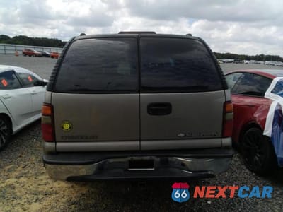 Zdjęcie 6 z 13 samochodu: 2003 CHEVROLET SUBURBAN C1500 VIN:1GNEC16Z33J202863 - miniatura