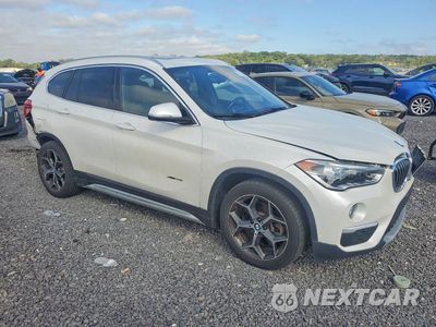 Czwarte zdjęcie samochodu z boku: 2016 BMW X1 XDRIVE28I VIN:WBXHT3C31GP880633 - miniatura