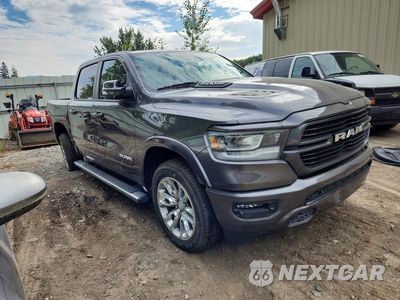 Czwarte zdjęcie samochodu z boku: 2021 RAM 1500 LARAMIE VIN:1C6SRFJT7MN615171 - miniatura