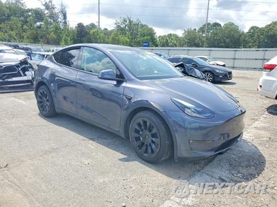 Czwarte zdjęcie samochodu z boku: 2023 TESLA MODEL Y VIN:7SAYGDEE7PF747099 - miniatura
