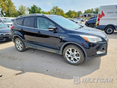 Czwarte zdjęcie samochodu z boku: 2016 FORD ESCAPE TITANIUM VIN:1FMCU9J92GUC38028 - miniatura