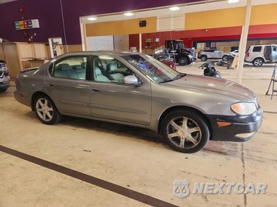 Czwarte zdjęcie samochodu z boku: 2003 INFINITI I35 BASE VIN:JNKDA31A63T106297 - miniatura