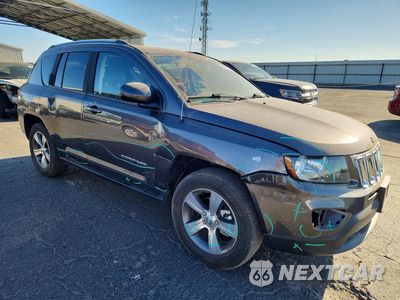 Czwarte zdjęcie samochodu z boku: 2016 JEEP COMPASS LATITUDE VIN:1C4NJCEA3GD749349 - miniatura