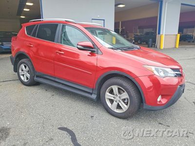 Czwarte zdjęcie samochodu z boku: 2014 TOYOTA RAV4 XLE VIN:2T3WFREV4EW074140 - miniatura