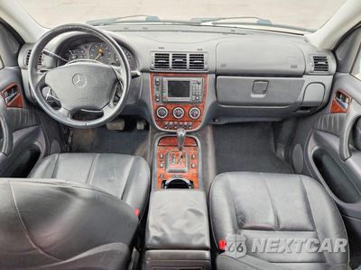 Zdjęcie 8 z 13 samochodu: 2002 MERCEDES-BENZ ML 320 VIN:4JGAB54E52A355594 - miniatura