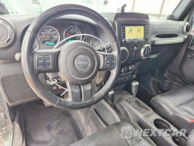 Zdjęcie 8 z 13 samochodu: 2011 JEEP WRANGLER SAHARA VIN:1J4GA5D15BL539298 - miniatura