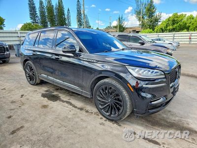 Czwarte zdjęcie samochodu z boku: 2023 LINCOLN AVIATOR RESERVE VIN:5LM5J7WC1PGL14599 - miniatura