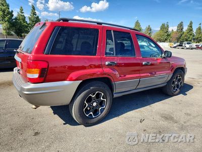 Trzecie zdjęcie samochodu z tyłu: 2004 JEEP GRAND CHEROKEE LAREDO VIN:1J4GW48S84C239126 - miniatura