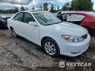 Czwarte zdjęcie samochodu z boku: 2004 TOYOTA CAMRY LE VIN:JTDBE32K640286436 - miniatura