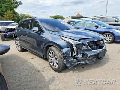 Czwarte zdjęcie samochodu z boku: 2021 CADILLAC XT4 SPORT VIN:1GYFZER48MF035000 - miniatura