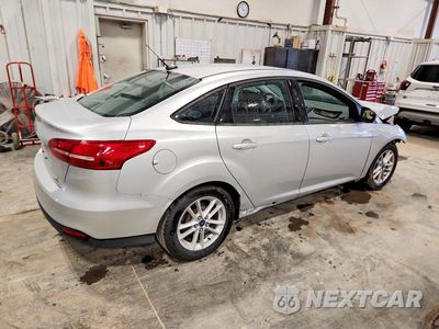 Trzecie zdjęcie samochodu z tyłu: 2015 FORD FOCUS SE VIN:1FADP3F21FL313191 - miniatura