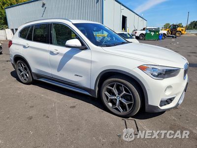 Czwarte zdjęcie samochodu z boku: 2016 BMW X1 XDRIVE28I VIN:WBXHT3C32GP888675 - miniatura