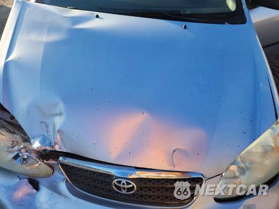 Zdjęcie 11 z 12 samochodu: 2007 TOYOTA COROLLA CE VIN:1NXBR32E07Z798183 - miniatura