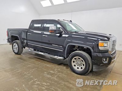 Czwarte zdjęcie samochodu z boku: 2019 GMC SIERRA K2500 DENALI VIN:1GT12SEY6KF215147 - miniatura