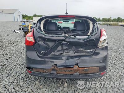 Zdjęcie 6 z 12 samochodu: 2013 FORD FOCUS TITANIUM VIN:1FADP3N26DL370503 - miniatura