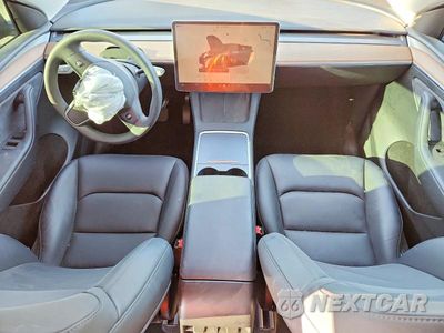 Zdjęcie 8 z 13 samochodu: 2024 TESLA MODEL Y VIN:7SAYGDEE7RF991046 - miniatura