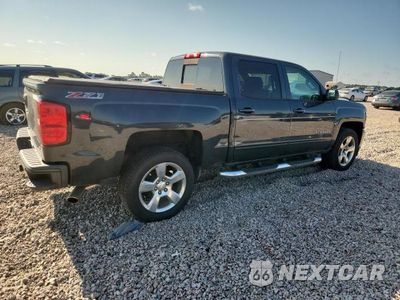 Trzecie zdjęcie samochodu z tyłu: 2017 CHEVROLET SILVERADO K1500 LT VIN:3GCUKREC4HG176186 - miniatura