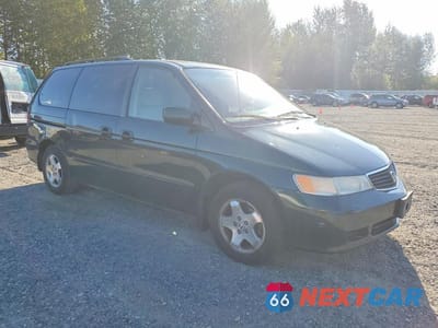 Czwarte zdjęcie samochodu z boku: 1999 HONDA ODYSSEY EX VIN:2HKRL1864XH514301 - miniatura