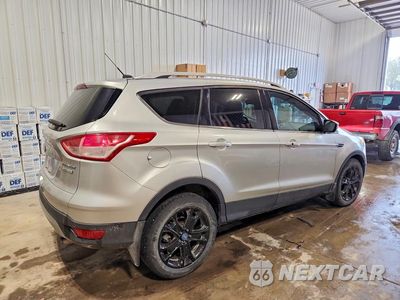 Trzecie zdjęcie samochodu z tyłu: 2014 FORD ESCAPE TITANIUM VIN:1FMCU0JX6EUC19571 - miniatura