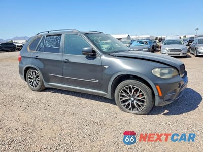 Czwarte zdjęcie samochodu z boku: 2011 BMW X5 XDRIVE35I VIN:5UXZV4C55BL742689 - miniatura