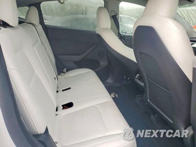 Zdjęcie 10 z 12 samochodu: 2024 TESLA MODEL Y VIN:7SAYGDEE7RA233348 - miniatura