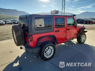 Trzecie zdjęcie samochodu z tyłu: 2011 JEEP WRANGLER UNLIMITED SAHARA VIN:1J4HA5H1XBL534497 - miniatura