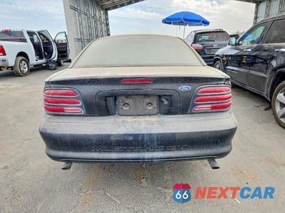 Zdjęcie 6 z 12 samochodu: 1995 FORD MUSTANG GT VIN:1FALP42T8SF197089 - miniatura